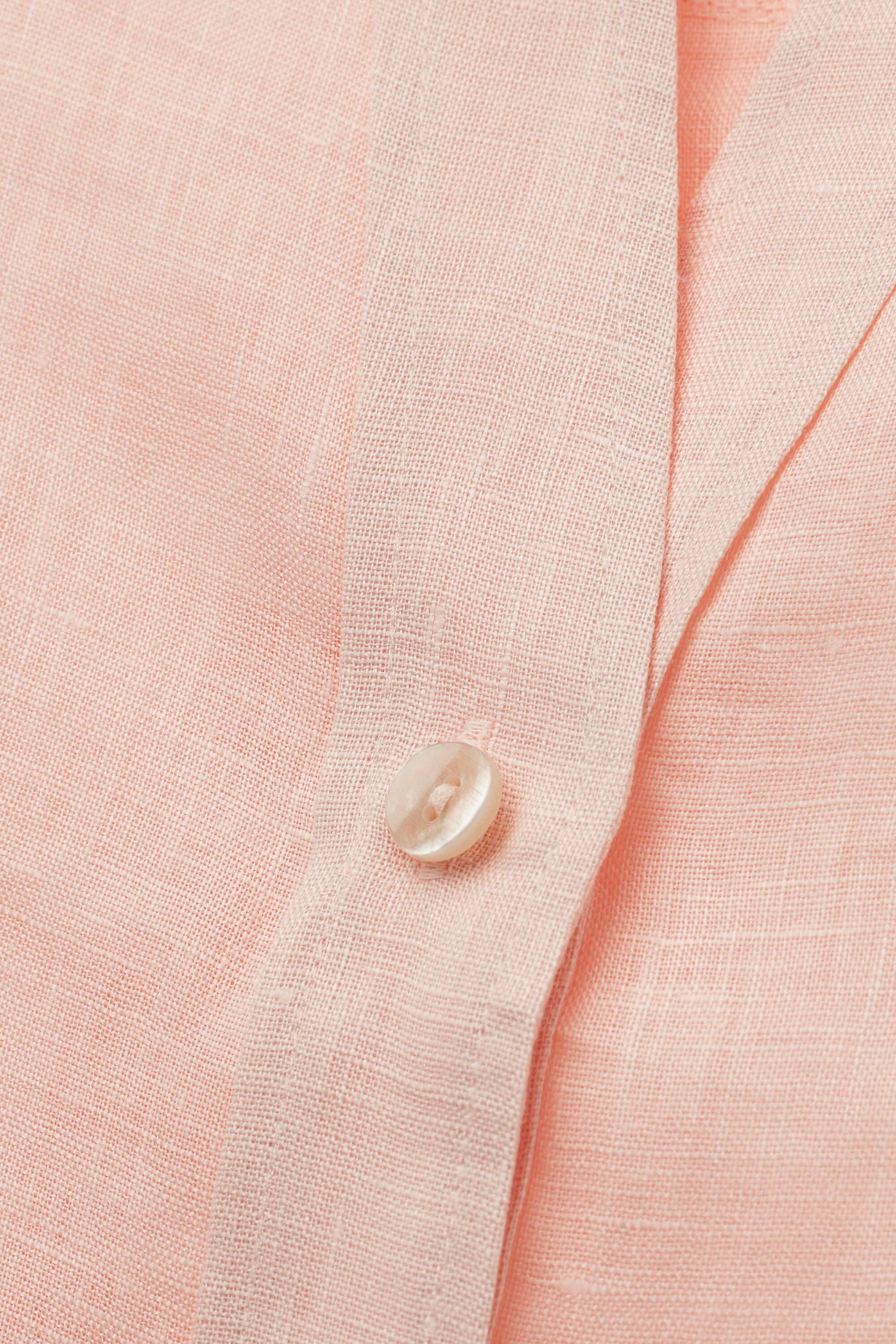 חולצת פשתן מכופתרת